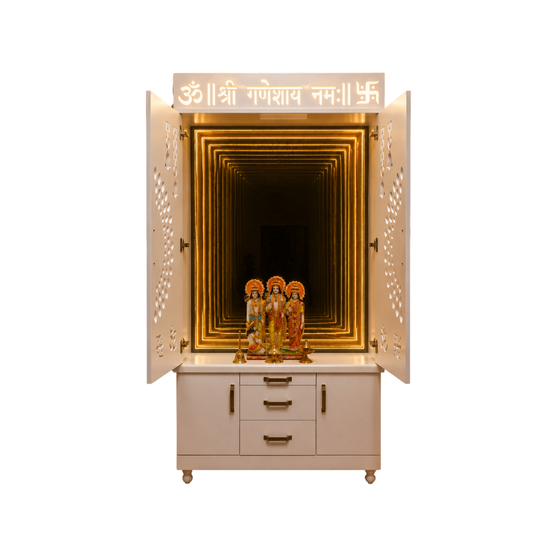 A cream-colored Shree Ganesh Hall with open doors, showcasing a golden illuminated tunnel interior and a set of four Lord Ganesha statues on a white marble top. The cabinet features gold handles and a white signboard with Sanskrit mantras at the top, set against a solid white background.